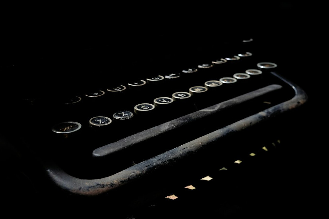 Close-up of typewriter keys with warm light