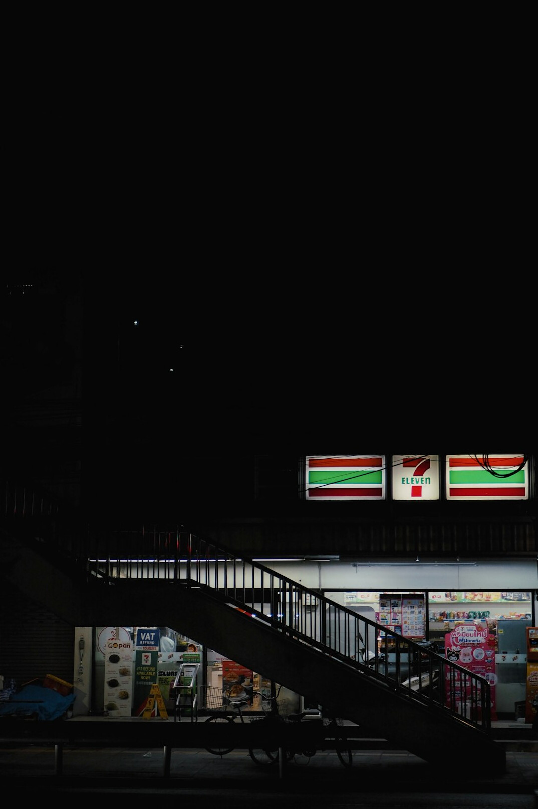 man in convenience store at night