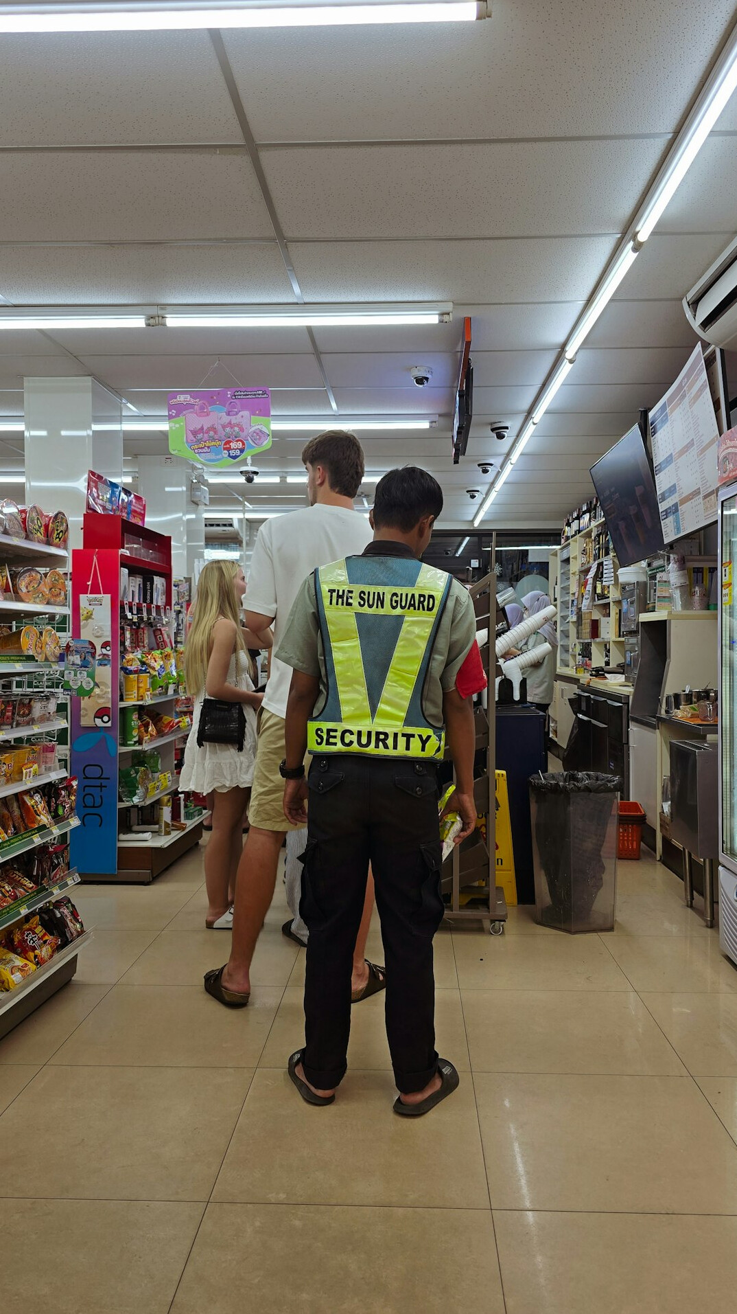 store detective observing customer