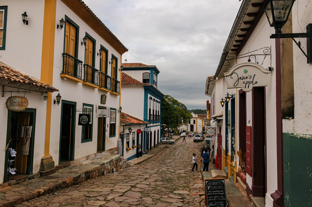 Narrow old colonial street with balconies