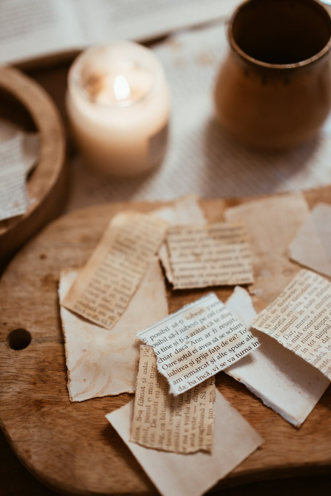 Old newspaper clippings spread on a table