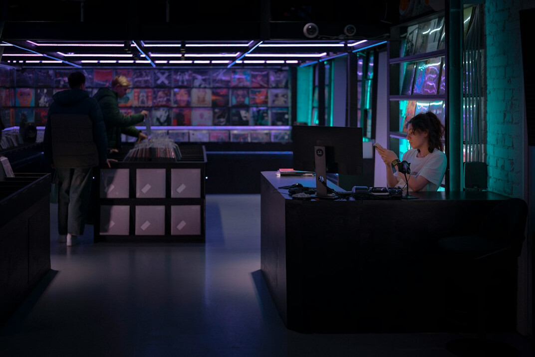 store detective watching surveillance